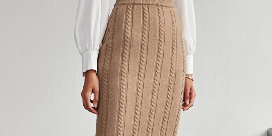 A lady in a camel knitted skirt with slits