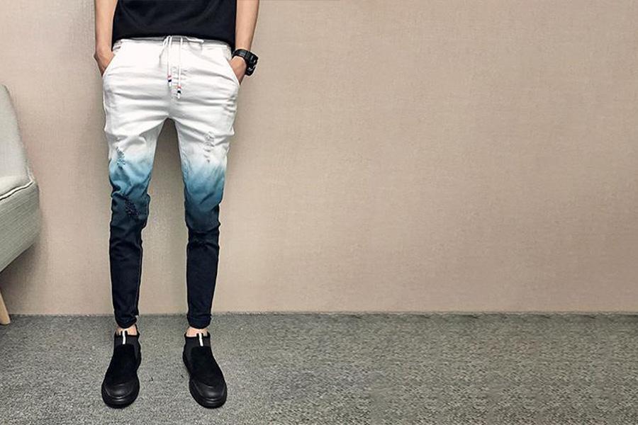 A man in ombre gradient denims