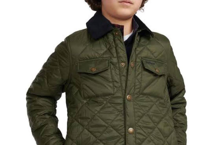 Boy wearing a green insulated down jacket