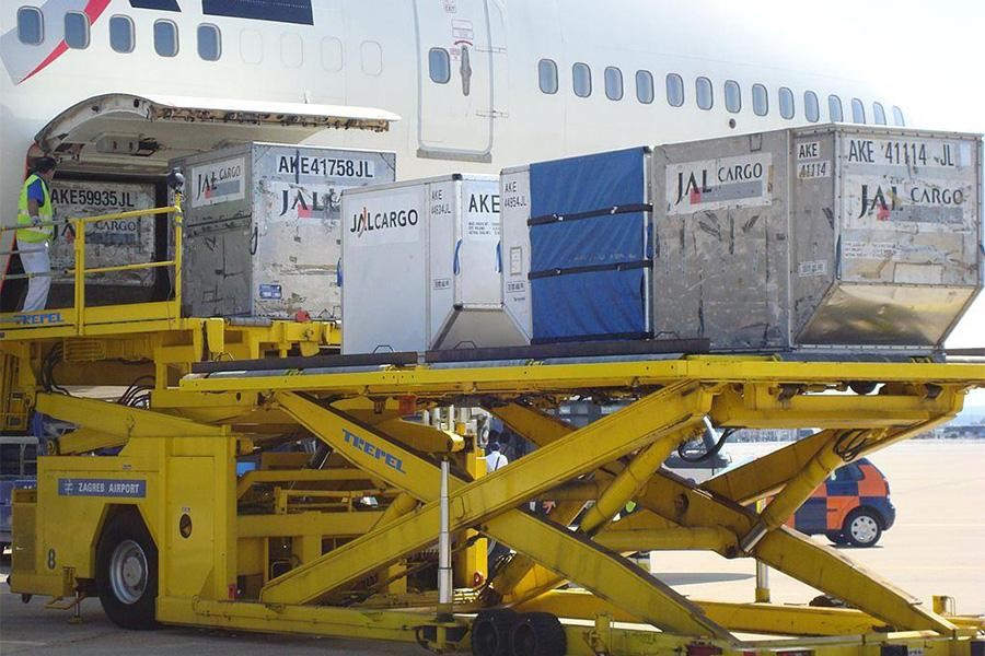 Cargo containers loading onto an aircraft
