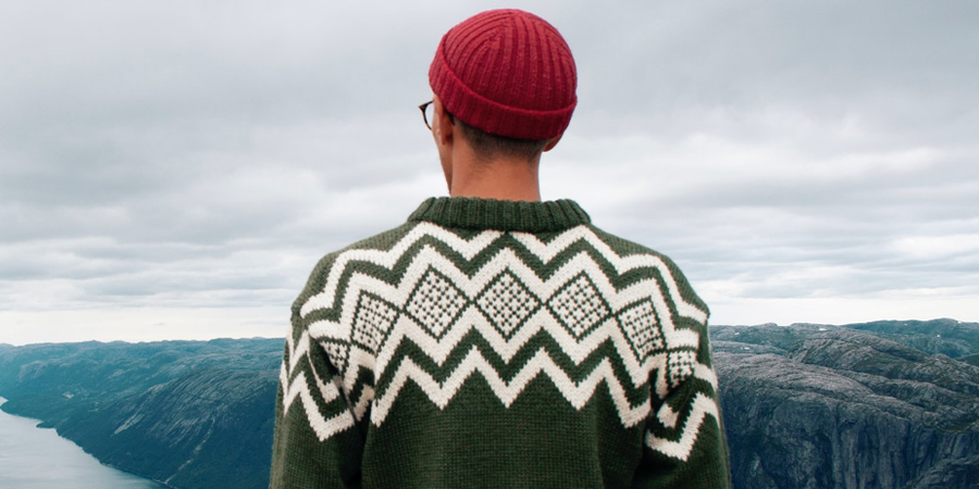 Green and white men’s knitted jumper