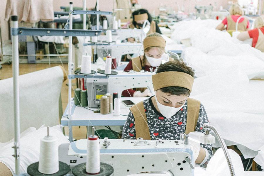 Ladies busy at work in a sewing factory