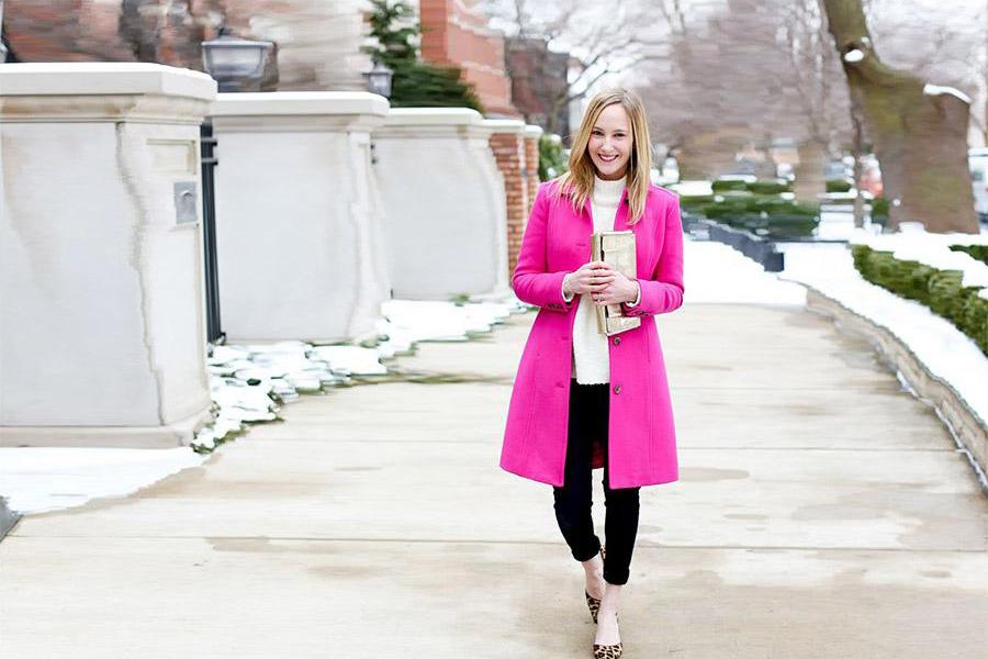 Lady rocking a pink jacket and black top