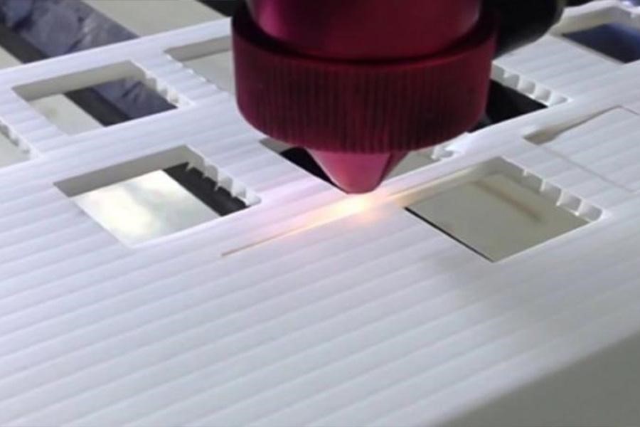 Plastic laser cutting material in action