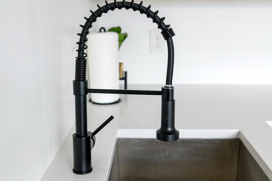 A pull-down kitchen faucet
