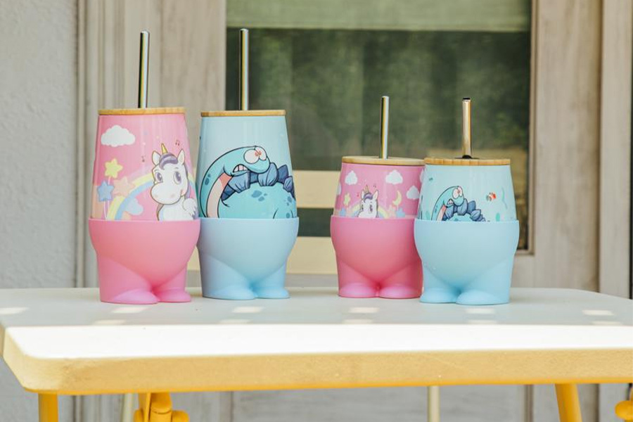 Selection of kids’ mugs with lids and straws