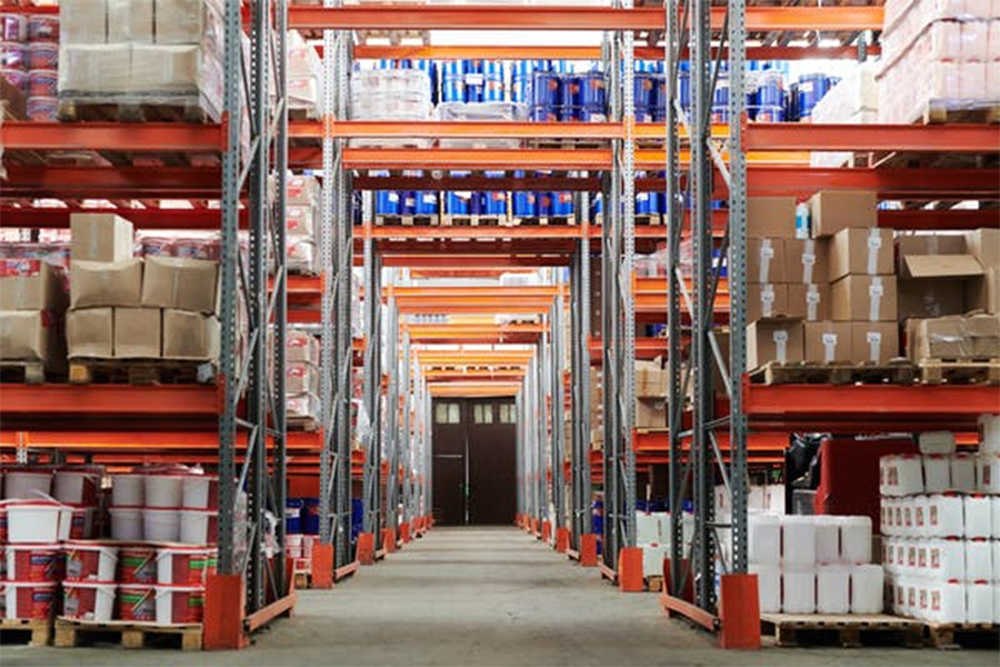 Shelves with goods in a warehouse