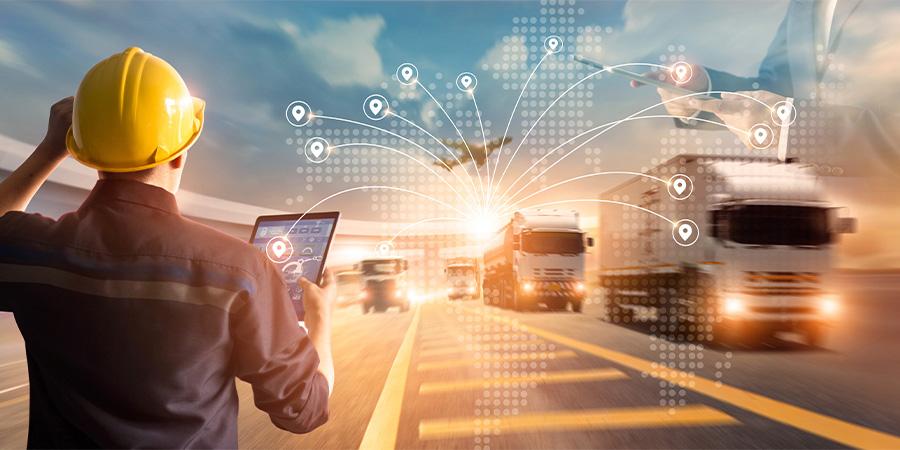Transportation and logistics concept, managers and engineers check and control logistics network distribution and tablet data on highway background