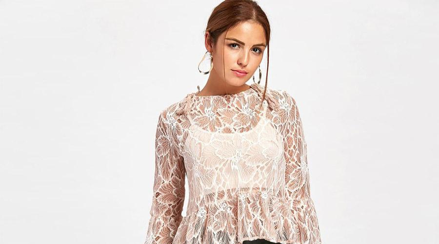 Woman in a cream see-through lace top