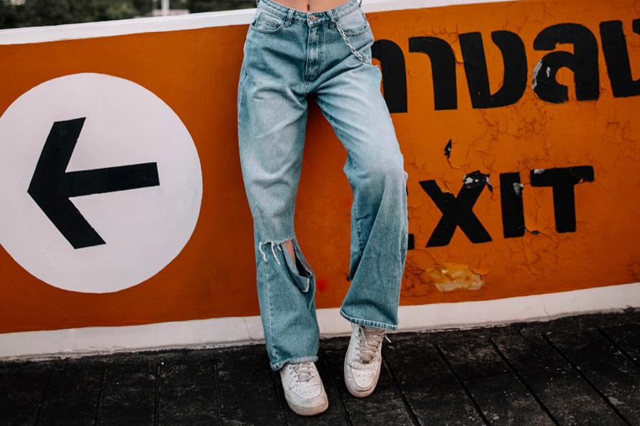 Woman wearing denim straight jeans