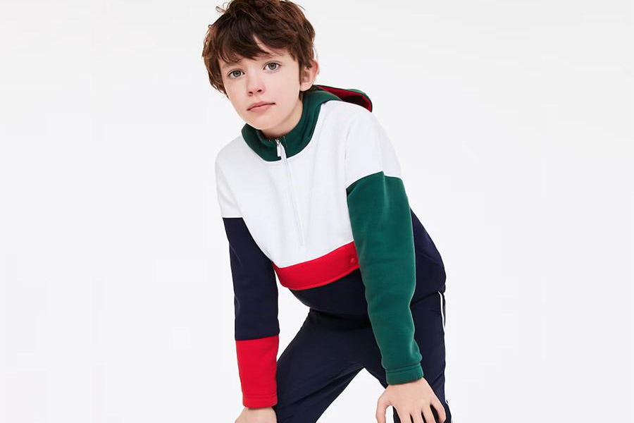 Young boy in a multi-colored hoodie
