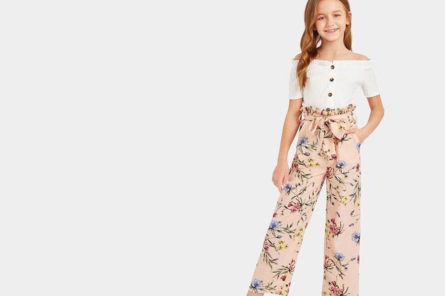Young girl rocking floral-print pants