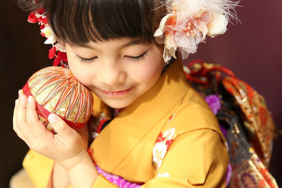 A girl dressed up in traditional Japanese attire