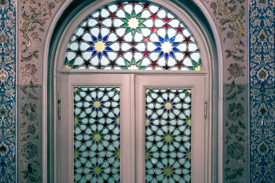 A white door with stained glass detailing