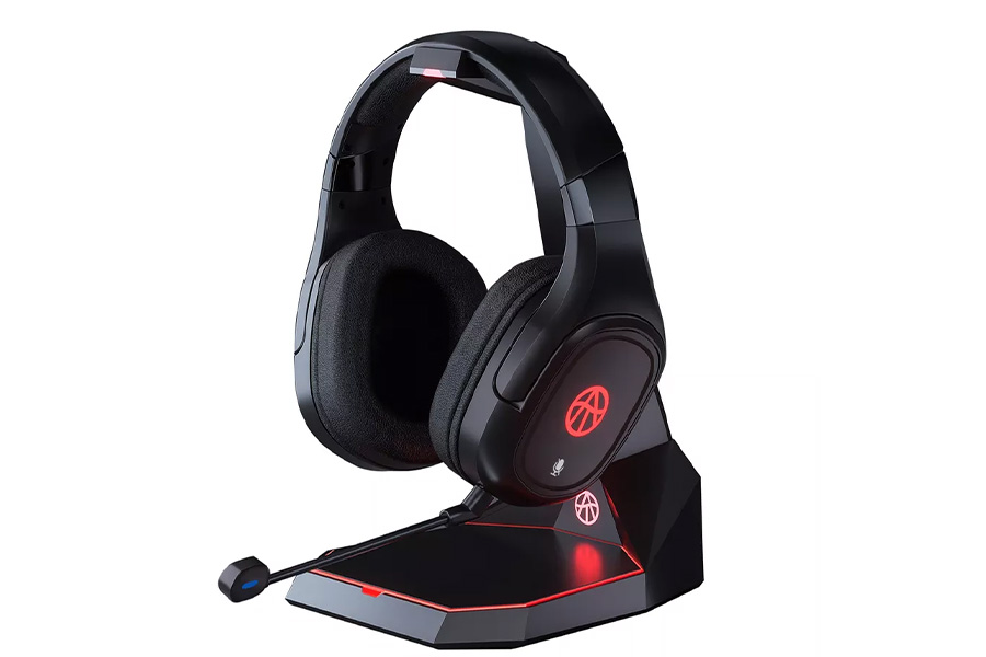 Black and red gaming headset on a chargeable stand