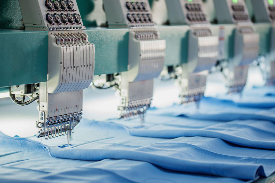 Industrial embroidery machine during operation