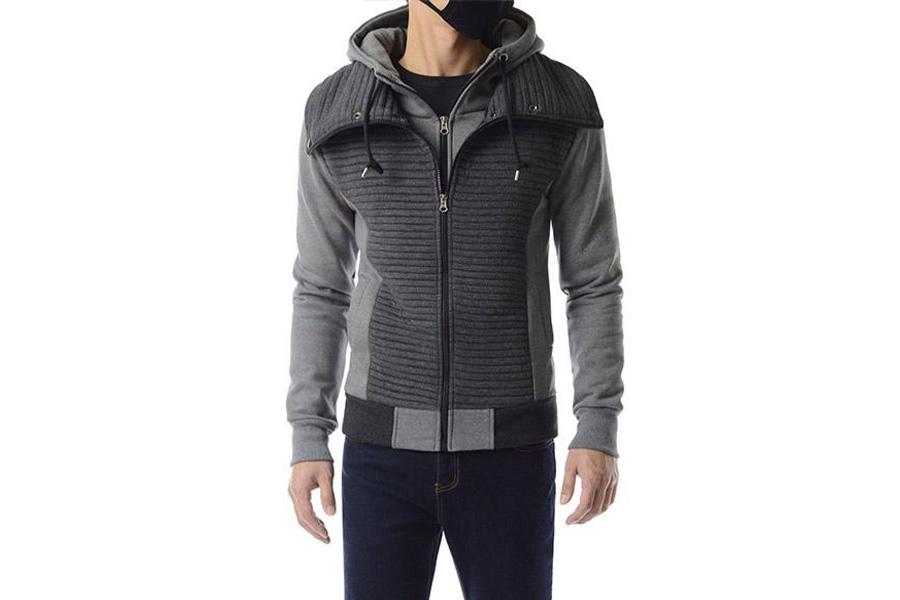 Man in a gray quilted hoodie jacket