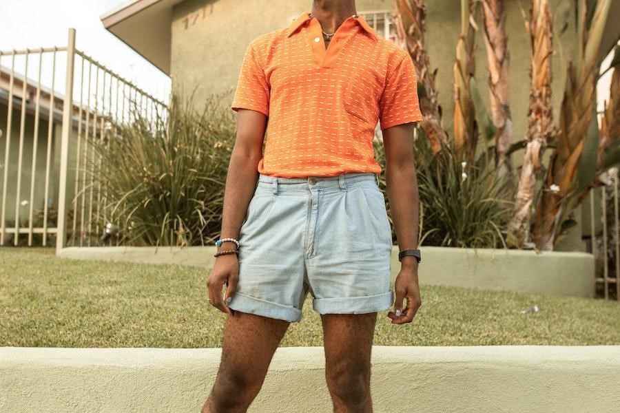 Man posing with denim short boxer shorts
