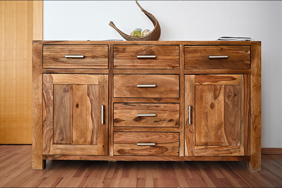 A natural wood contemporary sideboard with handles