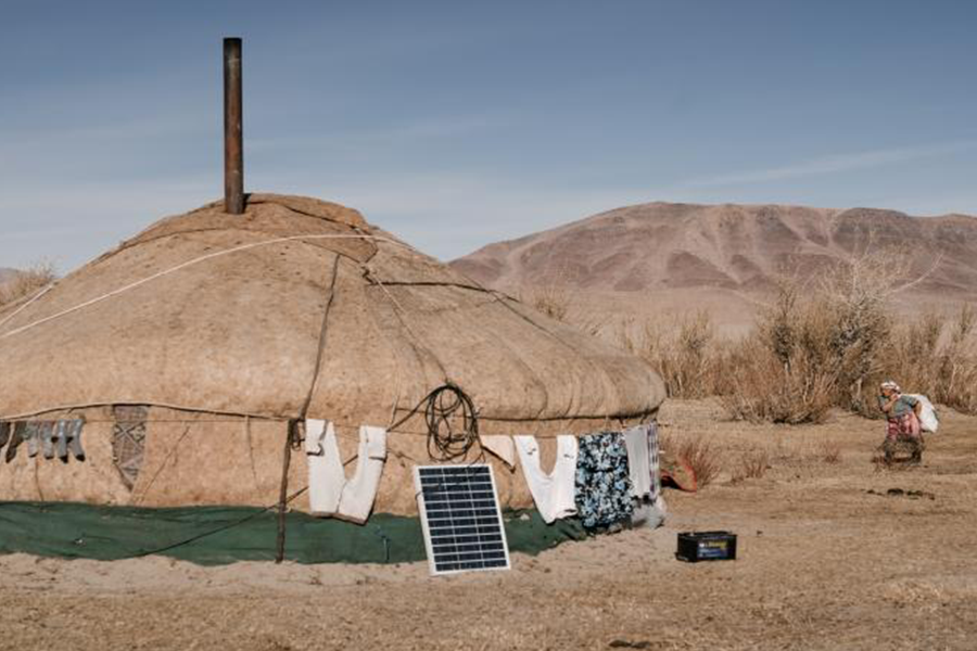 Solar panel outside a traditional yurt house