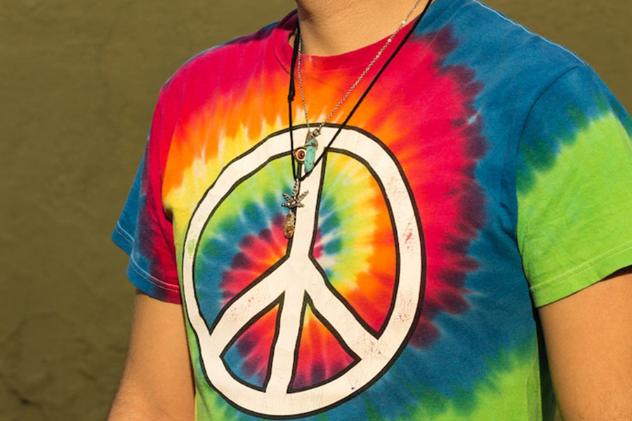 Teen donning graphic psychedelic T-shirt