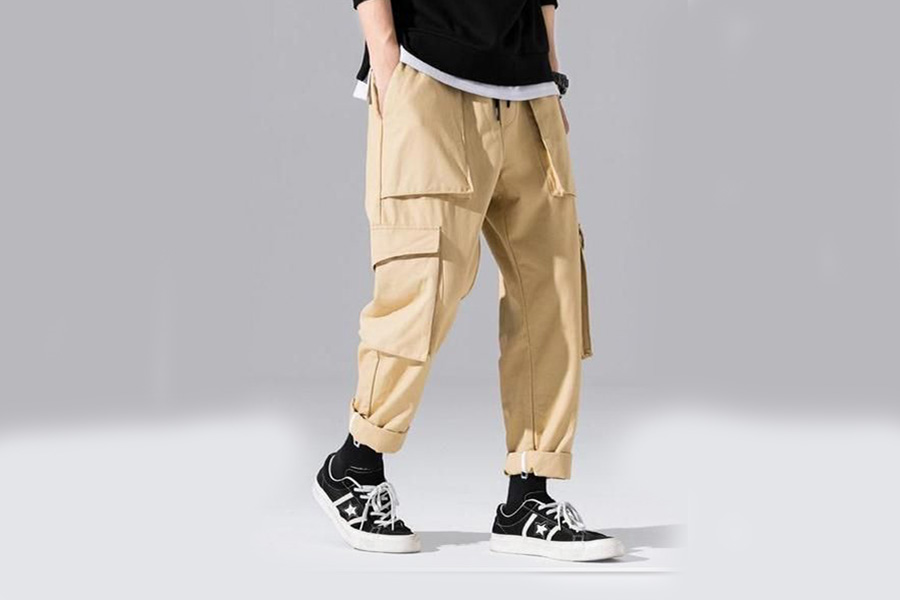 Teen posing with light brown cargo pants