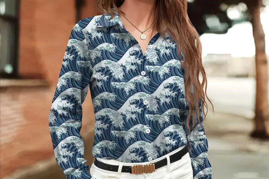 Woman rocking a blue shirt with white fluid waves design-print