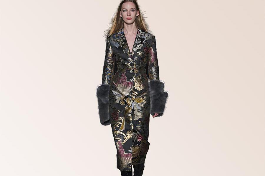 Woman wearing a designer Autumn:Winter jacquard dress