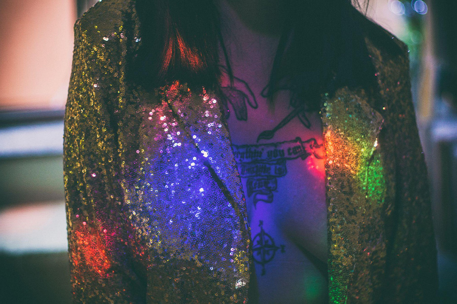 Woman wearing a sequin-adorned jacket