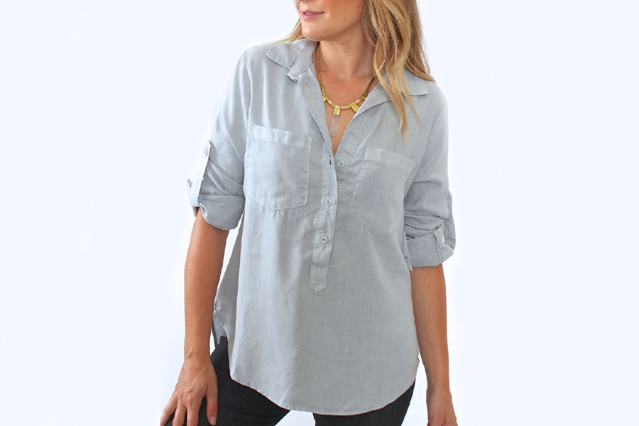 Woman wearing shirt with buttoned-down placket