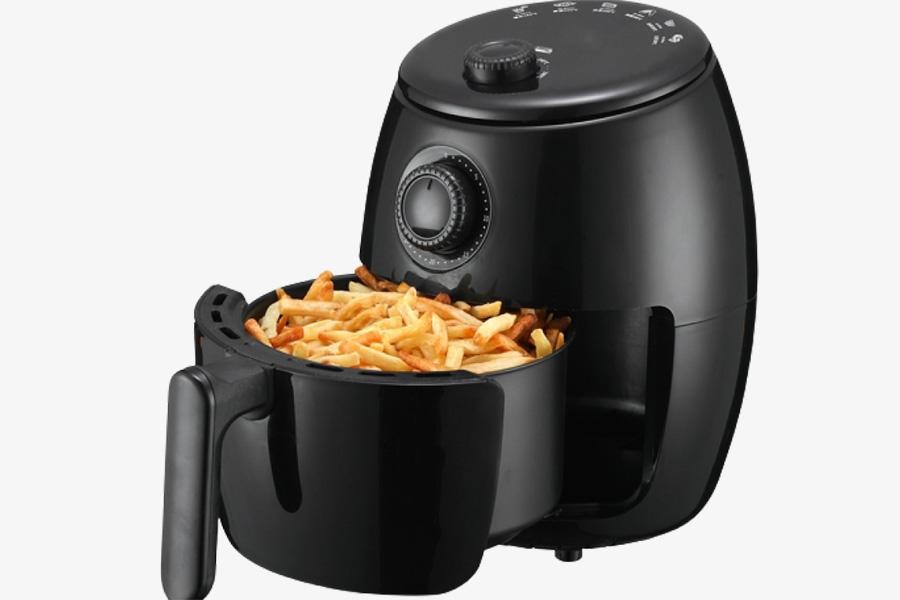 Black air fryer with manual dials