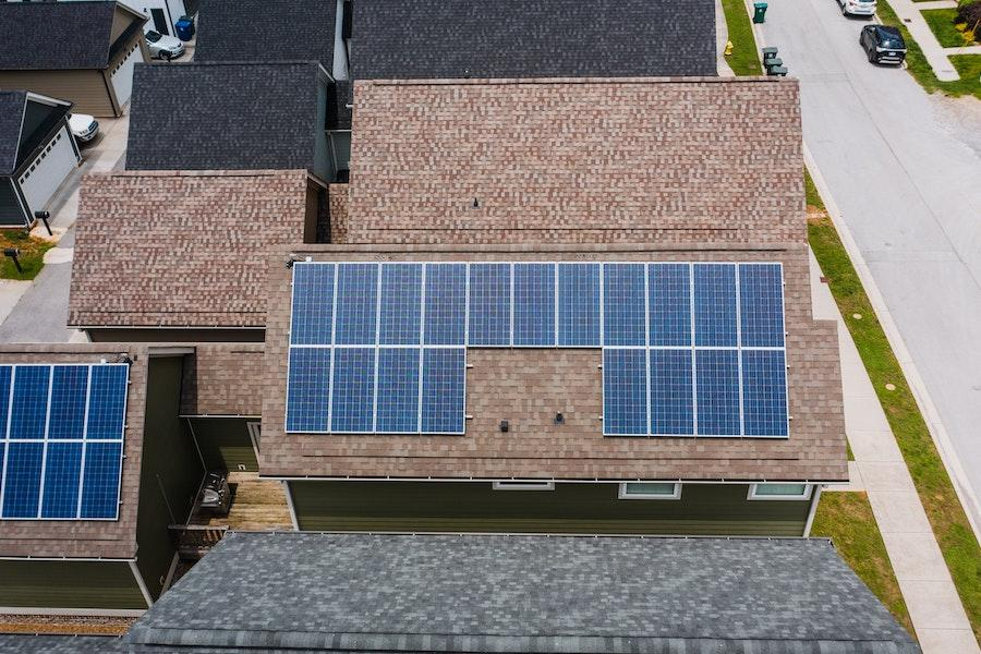 Houses with solar panels on roof