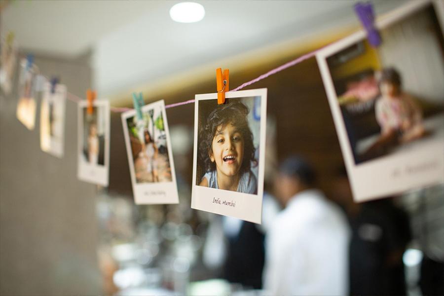 Instant photos hung on a cord for room decoration