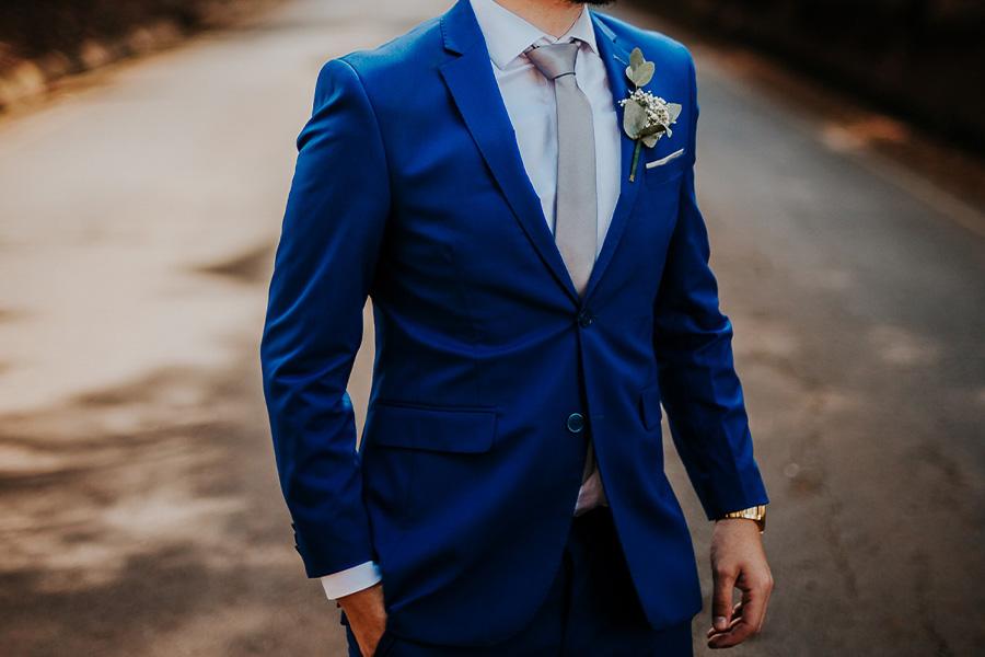 Man posing with a sharp blue blazer