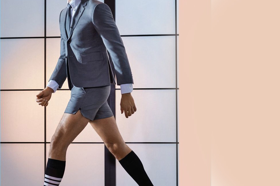 Man walking in a shorts suit