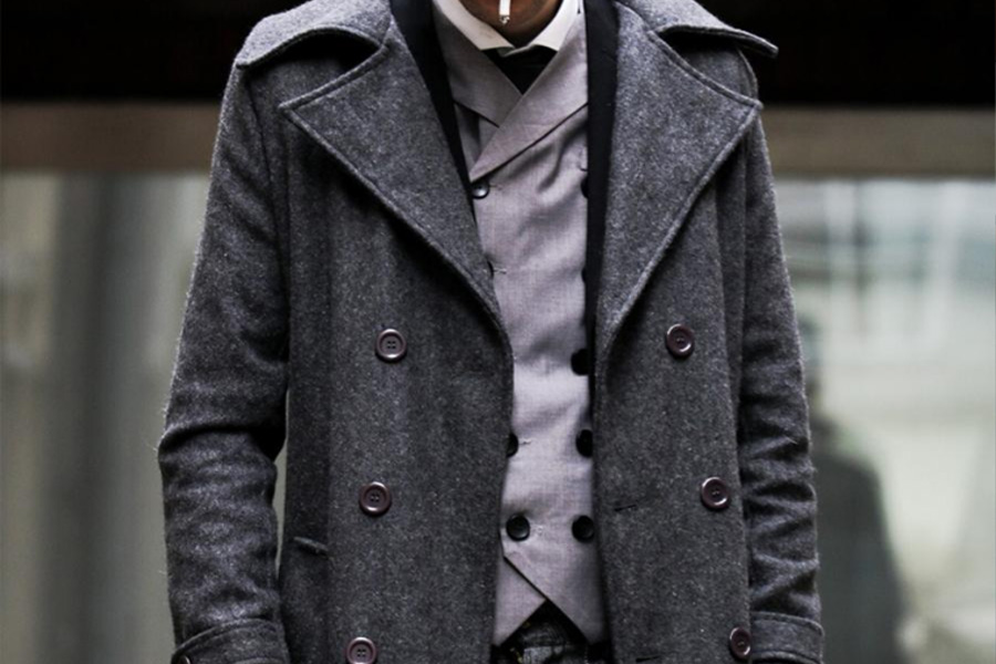 Man wearing a gray-colored tech jacket