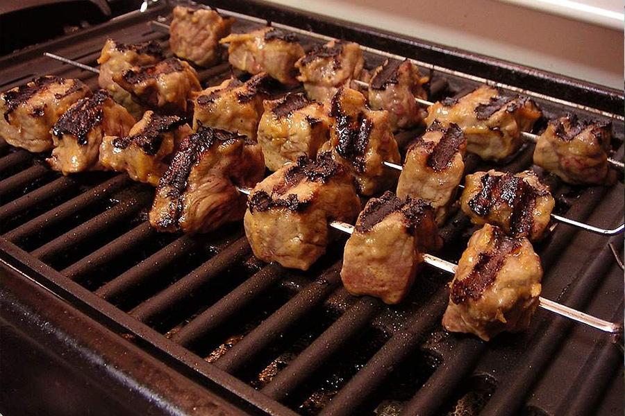Meat grilling on an electric grill