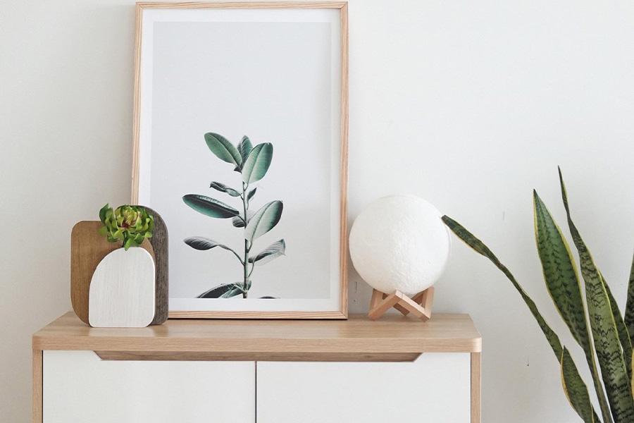 Minimalist frame sitting on a side table as decoration