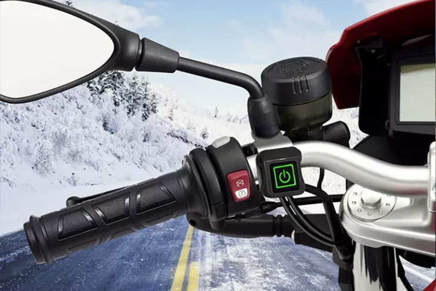 Motorcycle with black heated handlebars in the winter