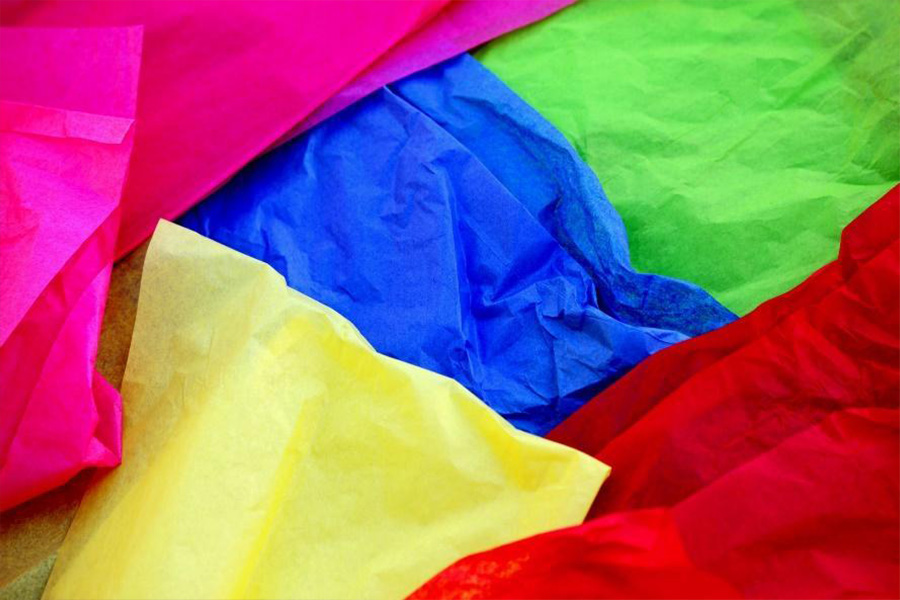 Pile of multi-colored tissue paper
