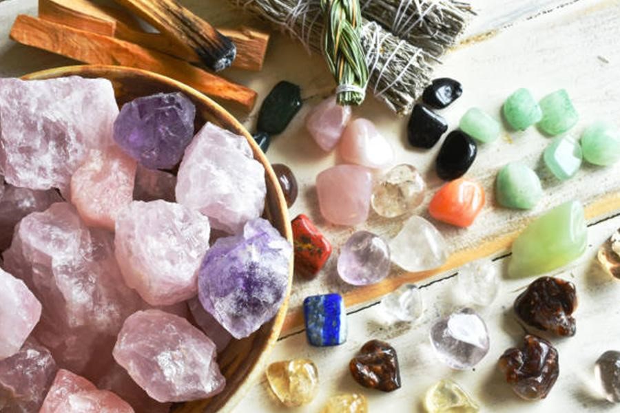 Variety of healing crystals laid out on a table