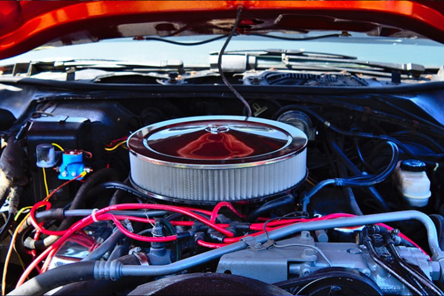 A car air filter fitted to an engine