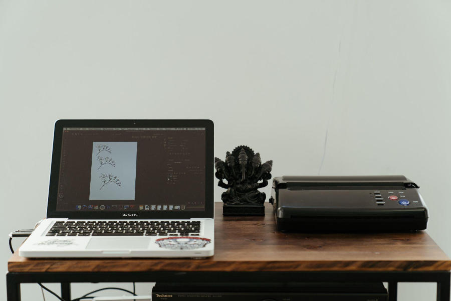 A compact size inkjet printer with a laptop