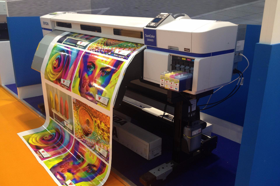 A large inkjet machine is printing large format flex