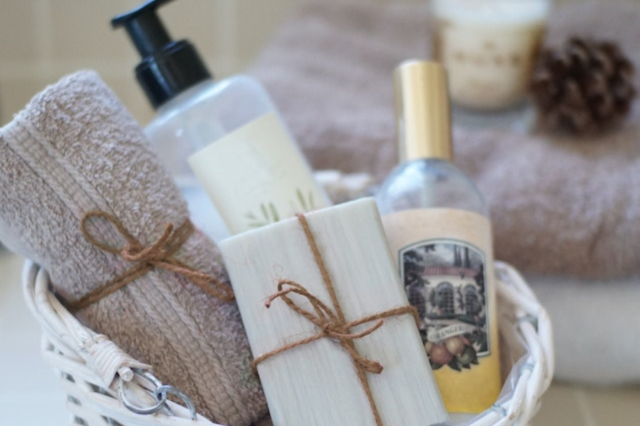 Bathing essentials in brown wicker basket