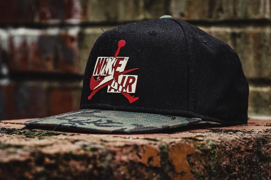 Black trucker hat with a Nike Air logo