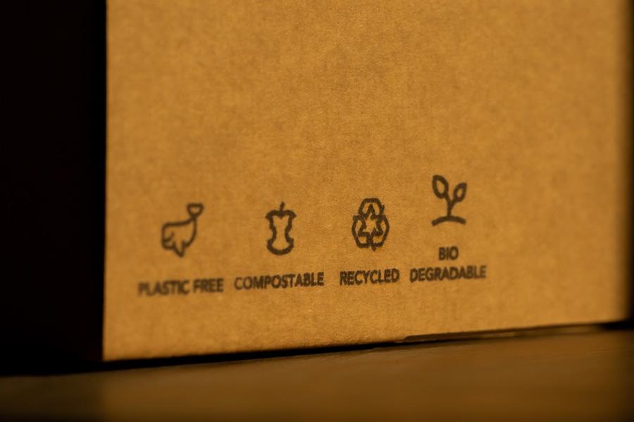 Close-up on the recycling symbols on a cardboard box