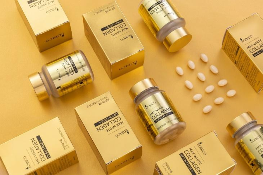 Collagen pills in gold packaging