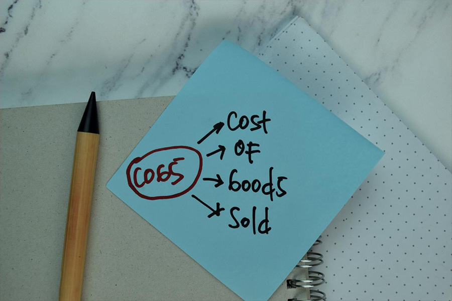 Cost of goods sold written on a sticky note