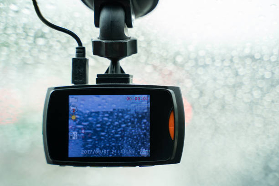 Dash camera recording in the rain from the front window